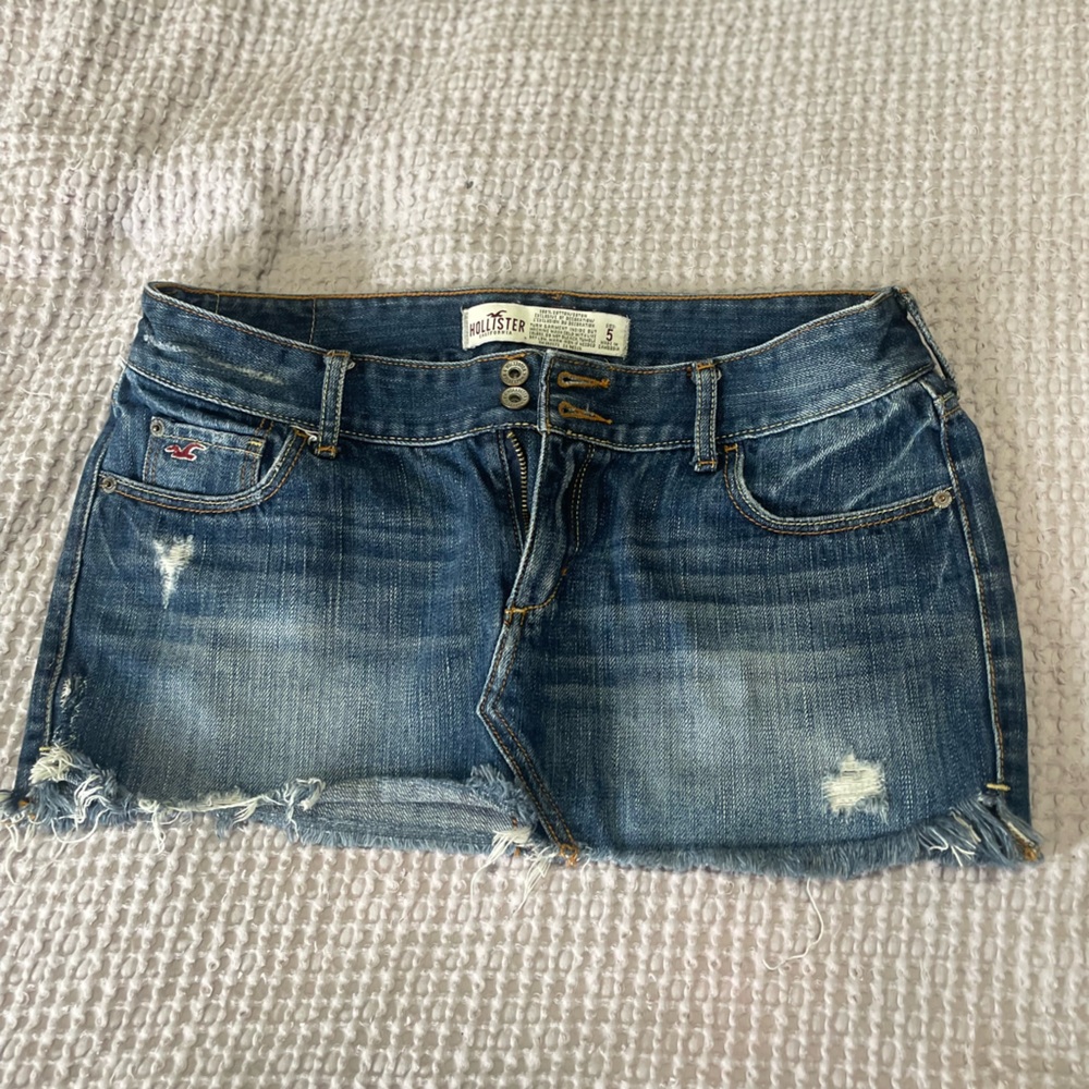 Distressed mini denim skirt